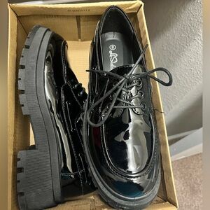 Black platform loafers